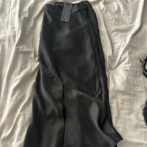 Black midi asymmetrical satin skirt